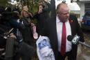 Toronto Mayor Ford yells at reporters and photographers to get off of his property in front of his house in Toronto