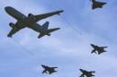 Military planes fly in formation during a NATO military exercise at the Birgi NATO Airbase in Trapani