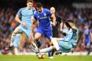 Chelsea's striker Diego Costa (C) vies with Manchester City's defender John Stones (L) and defender Nicolas Otamendi during the English Premier League football match December 3, 2016