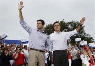 Republican U.S. presidential candidate Mitt Romney (R) and vice president select U.S. Congressman Paul Ryan (R-WI) wave to supporters during a campaign event in Waukesha, Wisconsin August 12, 2012. REUTERS/Shannon Stapleton