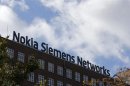 The logo of the telecommunications services company Nokia Siemens Networks is pictured on top their office in Berlin
