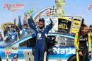 Dale Earnhardt Jr. celebrates in Victory Lane after winning the Talladega 500 NASCAR Sprint Cup Series auto race at Talladega Superspeedway, Sunday, May 3, 2015, in Talladega, Ala. (AP Photo/David Tulis)