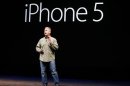 Phil Schiller, senior vice president of worldwide marketing at Apple Inc., introduces the iPhone 5 during Apple Inc.'s iPhone media event in San Francisco