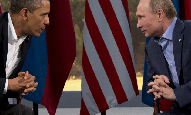 FILE - This June 17, 2013 file photo shows President Barack Obama meeting with Russian President Vladimir Putin in Enniskillen, Northern Ireland. President Barack Obama brushed aside sharp European criticism on Monday, suggesting all nations spy on each other, as the French and Germans expressed outrage over alleged U.S. eavesdropping on European Union diplomats. American analyst-turned-leaker Edward Snowden, believed to be stranded for the past week at Moscow’s international airport, applied for political asylum to remain in Russia. (AP Photo/Evan Vucci, File)