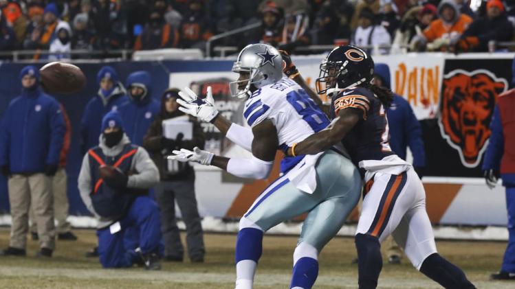 Dallas Cowboys wide receiver Dez Bryant (88) makes a touchdown reception against Chicago Bears cornerback Tim Jennings during the first half of an NFL football game, Monday, Dec. 9, 2013, in Chicago