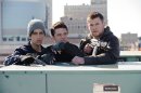 This film image released by Film District shows Josh Peck , left, Josh Hutcherson, center, and Chris Hemsworth in a scene from "Red Dawn." (AP Photo/Film District)