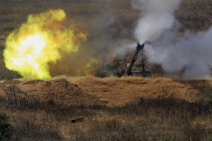 Israeli artillery fires towards Gaza, near the Israel &hellip;