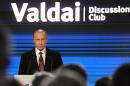 Russian President Vladimir Putin gives a speech at a Valdai Discussion Club meeting of political scientists in Sochi on October 27, 2016