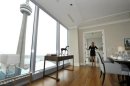 Sales Manager Jacqueline Yaffe poses in the dining room of the Ritz Carlton residents model suite in Toronto
