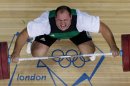 Peter Nagy of Hungary competes in the men's +105-kg, group B, weightlifting competition at the 2012 Summer Olympics, Tuesday, Aug. 7, 2012, in London. (AP Photo/Ng Han Guan)