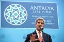 U.S. Secretary of State John Kerry speaks at the NATO foreign ministers meeting in Antalya, Turkey, Wednesday, May 13, 2015. A day after lengthy talks with Russian President Vladimir Putin, Kerry was filling in allies during a gathering of NATO foreign ministers in the southern Turkish town of Antalya. (Joshua Roberts/Pool Photo via AP)