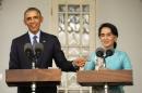 U.S. President Barack Obama and opposition politician Aung San Suu Kyi hold a press conference after their meeting at her residence in Yangon