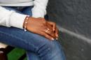 The hands of Eritrean migrant Ruta Fisehaye are seen as she poses for a photograph in Catania, Italy