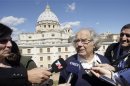 Adolfo Perez Esquivel speaks with media after a private meeting at the Vatican with Pope Francis, in Rome