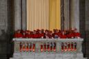Cardinals stand on a balcony as the new Pope Francis is announced at the Vatican on March 13, 2013