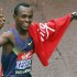 Olympic bronze medallist Kebede of Ethiopia celebrates after winning his seventh successive London men's marathon title in London