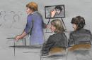 In this courtroom sketch, prosecutor Nadine Pellegrini makes opening arguments during the first day of the penalty phase in the trial of Boston Marathon bomber Dzhokhar Tsarnaev, seated at right, Tuesday, April 21, 2015, in federal court in Boston. Pellegrini displayed a photo to the jury of Tsarnaev extending his middle finger to a security camera taken in his jail cell three months after the attack. (AP Photo/Jane Flavell Collins)