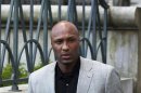 Basketball player Lamar Odom departs the New York state Supreme Court after a child custody hearing with his ex-girlfriend, Liza Morales, in Manhattan