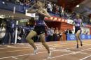 Matt Centrowitz, left, crosses the finish line first ahead of Nick Willis to win the Wanamaker Mile at the Millrose Games, Saturday, Feb. 20, 2016, in New York. (AP Photo/Julie Jacobson)