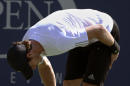 Andy Murray, of the United Kingdom, stretches his left leg during the opening round of the 2014 U.S. Open tennis tournament against Robin Haase, of the Netherlands, Monday, Aug. 25, 2014, in New York. (AP Photo/Kathy Willens)