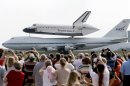 Space shuttle Endeavour sits atop NASA's Shuttle Carrier Aircraft, or SCA, Wednesday, Sept. 19, 2012, at Ellington Field in Houston. Endeavour is making a final trek across the country to the California Science Center in Los Angeles, where it will be permanently displayed. (AP Photo/David J. Phillip)