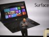 Microsoft CEO Steve Ballmer unveils "Surface", a new tablet computer to compete with Apple's iPad, at Hollywood's Milk Studios in Los Angeles Monday, June 18, 2012. The 9.3 millimeter thick tablet comes with a kickstand to hold it upright and keyboard that is part of the device's cover. It weighs under 1.5 pounds. (AP Photo/Damian Dovarganes)