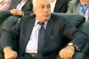 Iraqi Oil Minister Abdelkarim al-Luaybi attends a meeting to discuss oil production in Iraq, during a conference in Baghdad on March 27, 2013