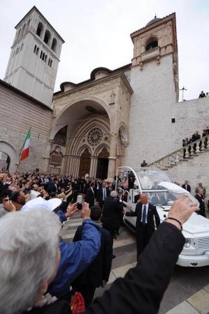 Pope Francis greets the crowd at the end of his papal …