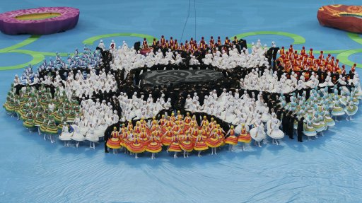 Performers take part in the Euro 2012 opening ceremony before the start of the Group A soccer match between Poland and Greece at the National Stadium in Warsaw