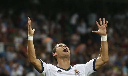 Real Madrid's Ronaldo reacts after they won their Spanish Super Cup second leg soccer match against Barcelona at Santiago Bernabeu stadium in Madrid