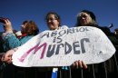A teenager holds a sign during the Ninth Annual Walk for Life West Coast rally in San Francisco