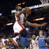 Miami Heat's Dwyane Wade, foreground, is fouled by Minnesota Timberwolves' Dante Cunningham as Wade goes to the basket during the half of an NBA basketball game Tuesday, Dec 18, 2012, in Miami. (AP Photo/Alan Diaz)