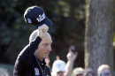 Jim Furyk acknowledges the gallery after posting a 59, tying the PGA single round record, during the second round of the BMW Championship golf tournament at Conway Farms Golf Club in Lake Forest, Ill., Friday, Sept. 13, 2013. (AP Photo/Charles Rex Arbogast)