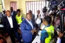 Gabon's President Ali Bongo Ondimba votes during the presidential election in Libreville, Gabon