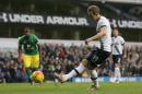 Tottenham Hotspur's Harry Kane scores a penalty during the English Premier League soccer match between Tottenham Hotspur and Norwich City at White Hart Lane in London, Saturday Dec. 26, 2015. (AP Photo/Tim Ireland)