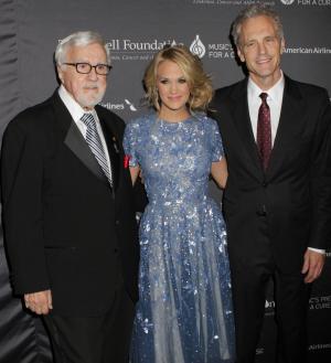 From left, Tony Martell, Carrie Underwood and John …