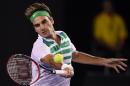 Switzerland's Roger Federer plays a forehand return during his men's singles match against Bulgaria's Grigor Dimitrov on day five of the Australian Open, on January 22, 2016