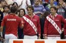 Switzerland's Federer and Lammer congratulate Wawrinka after winning his Davis Cup world group first round tennis match against Serbia's Lajovic in Novi Sad