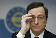 <p>               The President of the European Central Bank, ECB, Mario Draghi, speaks during a press conference in Frankfurt, central Germany, Thursday Dec. 6, 2012. The European Central Bank left rates unchanged at its meeting Thursday, and Mario Draghi gave little sign the bank was willing to add more stimulus. He said the bank had already done much to lower borrowing costs in heavily indebted countries that are struggling to grow. (AP Photo/dapd/ Alex Domanski)