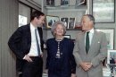 FILE - In this Wednesday, May 8, 1991, file photo, Katharine Graham, Chairman of the Washington Post poses with her son publisher Donald Graham, left, and Ben Bradlee, executive editor of the post, in her office in New York City. Donald Graham, whose grandfather bought the paper at a 1933 bankruptcy sale, announced to staff Monday, Aug. 5, 2013, that the paper had been sold to Amazon founder Jeff Bezos, closing the book on the paper's history as a family dynasty after seven straight years of declining revenue. (AP Photo/Dennis Cook, File)