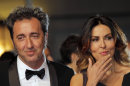 Director Paolo Sorrentino, left, and actress Sabrina Ferilli arrive for the screening of The Great Beauty at the Cannes film festival (AP)