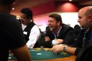 In this photo taken Saturday, Jan. 19, 2013, Mark Peters of Santa Clara University plays poker during the MBA Poker Championship and Recruitment Weekend at Planet Hollywood in Las Vegas. (AP Photo/Las Vegas Sun, Leila Navidi)