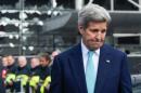 US Secretary of State John Kerry attends a ceremony at the Brussels National Airport to pay tribute to the victims of the terrorist attacks on March 25, 2016 in Zaventem