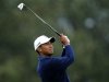 U.S. golfer Tiger Woods hits off the 17th tee of the north course at Torrey Pines during second round play at the Farmers Insurance Open in San Diego