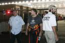 Sprint Cup Series driver Tony Stewart (14) walks to his motorhome after hitting the wall and retiring from a NASCAR Sprint Cup auto race at Atlanta Motor Speedway Sunday, Aug. 31, 2014, in Hampton, Ga.. (AP Photo/Brynn Anderson)