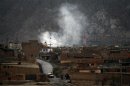 Smoke rises after a bomb attack in a Shi'ite Muslim area of the Pakistani city of Quetta