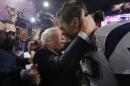 New England Patriots owner Kraft hugs quarterback Brady after their team defeated the Seattle Seahawks in the NFL Super Bowl XLIX football game in Glendale