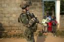 A French peacekeeping soldier patrols a street of the capital Bangui