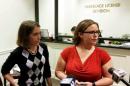 Jennifer Rose, a county government employee and Sara Meadows, a teacher, file a marriage license application in Charleston