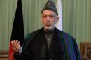 Afghan president Hamid Karzai speaks at the Presidential Palace in Kabul on November 30, 2013